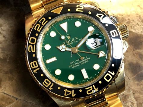 rolex gmt master ii gold green face|More.